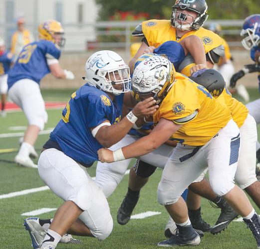 Taeshaun Hodge-Maroney helps stop the South late in the second quarter of the 2019 Lions All-Star Football Game.